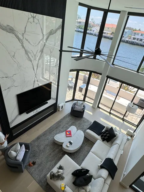 View from the upstairs loft down to the newly floored great room